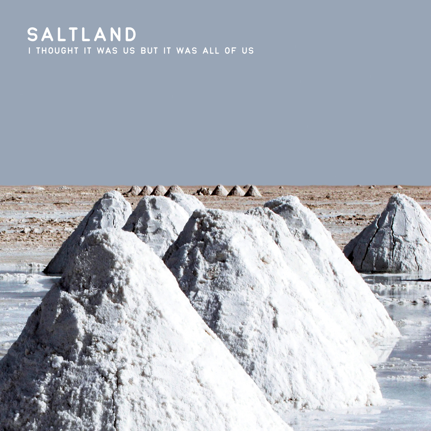 Piles of salt mined by local residents sit on the surface of the world's largest salt flats, the Salar de Uyuni